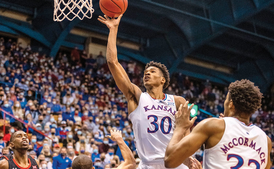 Teammates for life, Kansas' Ochai Agbaji, Christian Braun taken 7